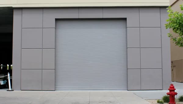 Custom aluminum framed security screen and rolling grille for after-hours storefront protection